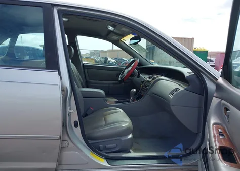 2002 Toyota Avalon Xls z USA, uszkodzony, nr VIN 4T1BF28B42U245772